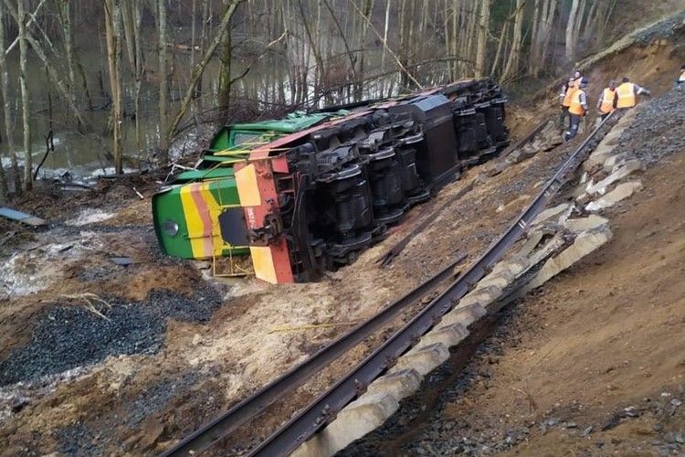 Derailed locomotive on the Russian track