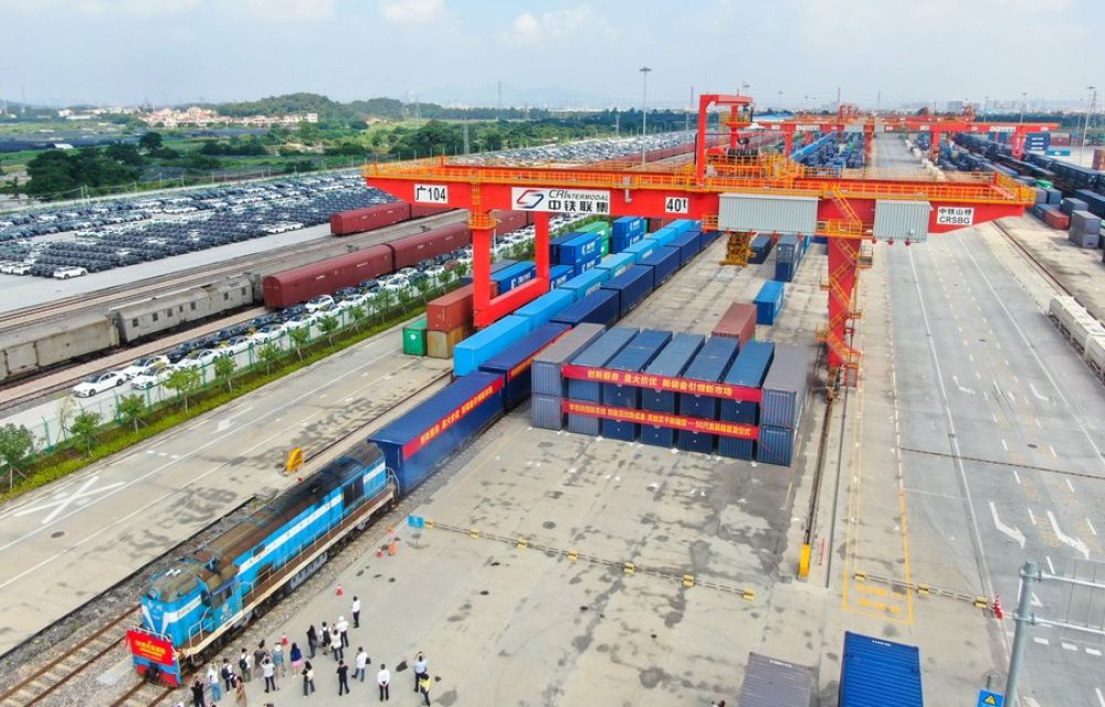 A 50ft container train departs from Guangzhou International Port Railway Station © Xinhua / Deng Hua